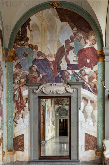 Medici Villa La Petraia, courtyard: “Clement VII crowns Charles V in Bologna”, fresco from the cycle of the Fasti Medicei by Volterrano (Baldassarre Franceschini), 1636-1647.
The scene shows the coronation of Charles V by Pope Clement VII which took place in Bologna in 1530.
Among the bystanders we recognize cardinals Ippolito de' Medici and Niccolò Ridolfi.
Villa medicea La Petraia, Firenze (FI) - Florence, Toscana - Tuscany, Italia - Italy