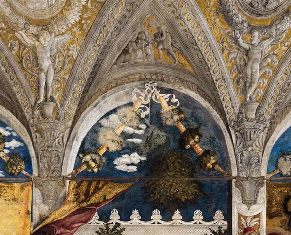 Ducal Palace: north-west wall of the “Bridal Chamber or Camera Picta", which is a room located in the north-east tower of the Castle of San Giorgio in Mantua. It is famous for the cycle of frescoes that covers its walls, a masterpiece by Andrea Mantegna, created between 1465 and 1474.
Detail of the lunette with festoons and heraldic symbols.
Palazzo Ducale, Mantova (MN) - Mantua, Lombardia - Lombardy, Italia - Italy