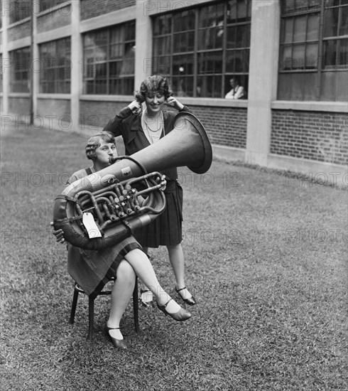 Woman Playing Tuba While Another Woman is Plugging her Ears, USA, Harris & Ewing, 1928