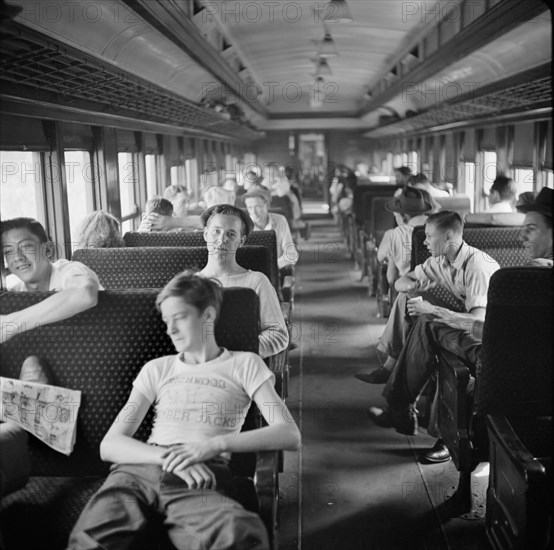 Special Train Bringing Agricultural Workers to Upstate New York, USA to work with the Harvest, John Collier for Farm Security Administration, September 1942