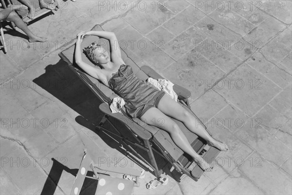 Woman Sunbathing Poolside, High Angle View, Marion Post Wolcott for Farm Security Administration, March 1939