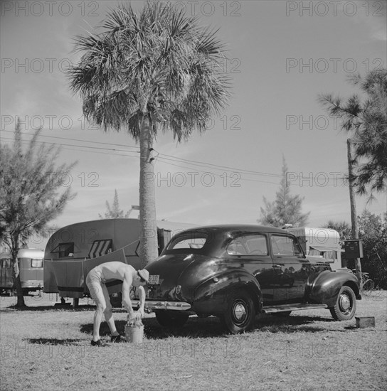 Man Washing Car at Trailer Park, Sarasota, Florida, USA, Marion Post Wolcott for Farm Security Administration, January 1941