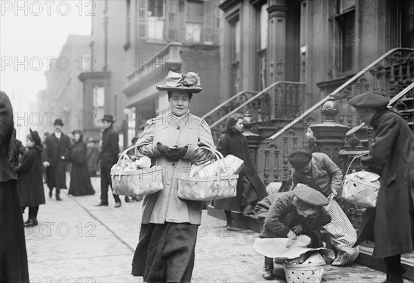 Woman Carrying Christmas Dinner Baskets from Salvation Army, New York City, New York, USA, Bain News Service, December 1908