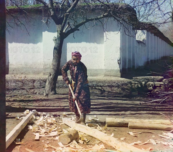 Man Shaving Bark from Log, Samarkand, Uzbekistan, Russian Empire, Prokudin-Gorskii Collection, 1910