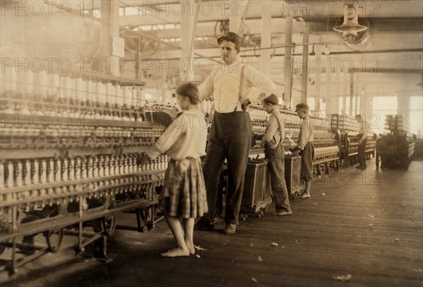 Young Spinners with Supervisor in Yarn Mill, Yazoo City, Mississippi, USA, Lewis Hine for National Child Labor Committee, May 1911