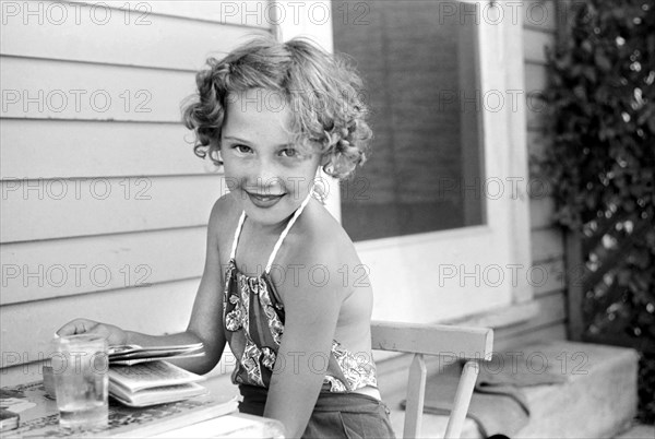 Smiling Young Girl, Child of Homesteader, Tygart Valley Homesteads, West Virginia, USA, John Vachon for U.S. Resettlement Administration, June 1939