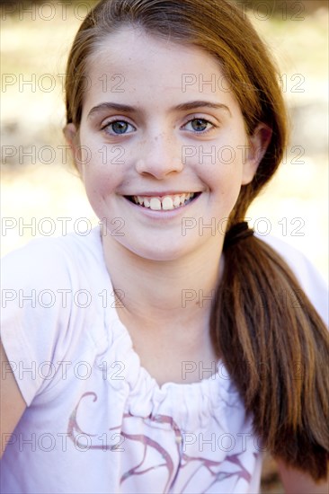 Girl With Pony Tail Smiling