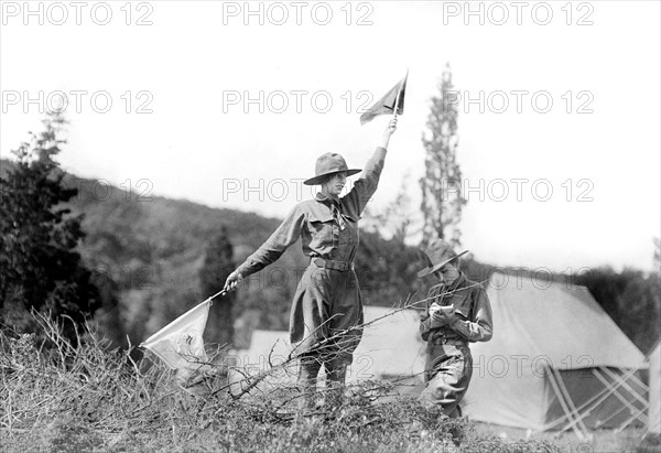 Elizabeth Harrison Walker (r),  daughter of U.S. President Benjamin Harrison and Katherine Dahlgren at Emergency Services Corps camp where young women were trained in shooting, military drills, hiking and other activities by Army officers, on the estate of Mr. and Mrs. Edward Hewitt, Passaic County, New Jersey, USA, Bain News Service, 1916