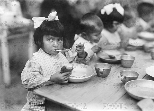 Children eating at one of the Colonies established by Comite Franco-Americain pour la Protection des Enfants de la Frontiere