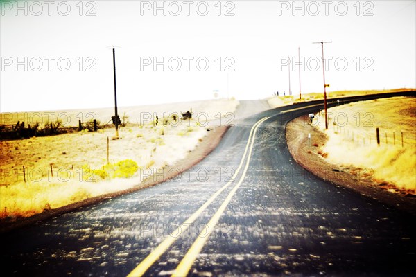 Hay scattered on Rural Two-Lane Highway ,,