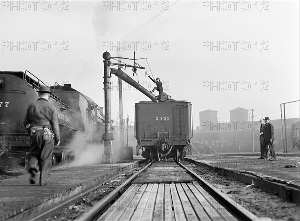 Female Railroad Worker working on Maintenance of Freight and Passenger Trains