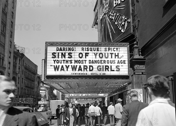 Street scene and risque movie marquee, 42nd Street, New York City, New York, USA, Marjory Collins, U.S. Office of War Information