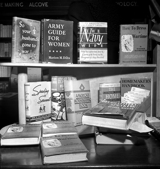 Selection of books on display at Christmas time during World War II, R.H. Macy and Company, New York City, New York, USA, Marjory Collins, U.S. Office of War Information, December 1942