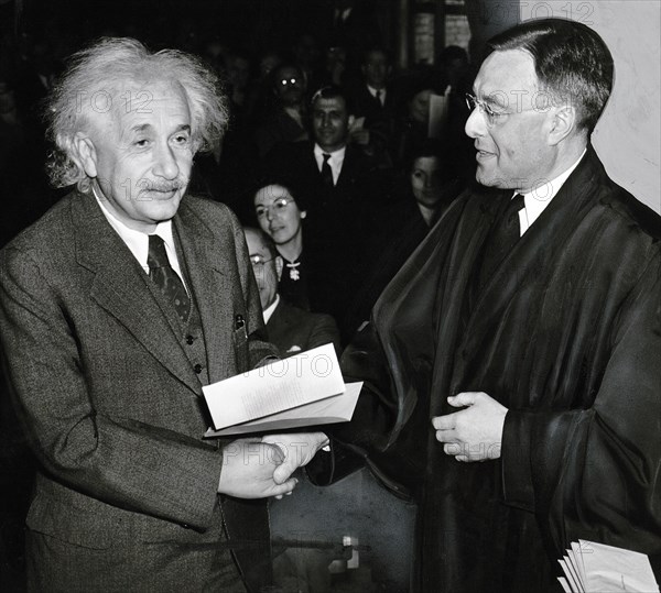 Albert Einstein receiving his certificate of American citizenship from Judge Phillip Forman, Trenton, New Jersey, USA, Al Aumuller, New York World-Telegram and the Sun Newspaper Photograph Collection, October 1, 1940