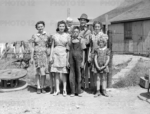 Wilfred Tow, FSA (Farm Security Administration) rural borrower, with his family, Laredo, Montana, USA, Marion Post Wolcott, U.S. Farm Security Administration, August 1941