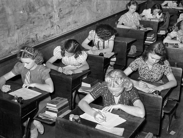 High School students doing school work in classroom, San Augustine, Texas, USA, Russell Lee, U.S. Farm Security Administration, April 1939