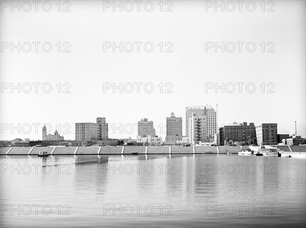 Business district with newly constructed seawall in foreground, Corpus Christi, Texas, USA, Russell Lee, U.S. Farm Security Administration