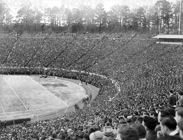 Crowd at Duke University versus University of North Carolina football game, Durham, North Carolina, USA, Marion Post Wolcott, U.S. Farm Security Administration, November 1939