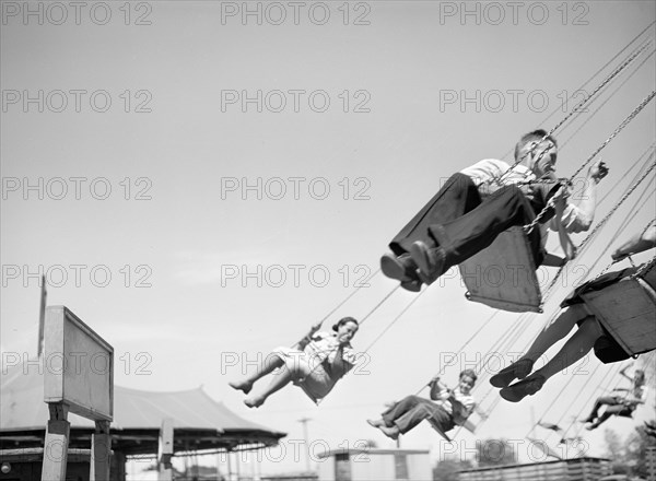 Carnival ride, part of Fourth of July celebration, Vale, Oregon, USA, Russell Lee, U.S. Farm Security Administration, July 1941