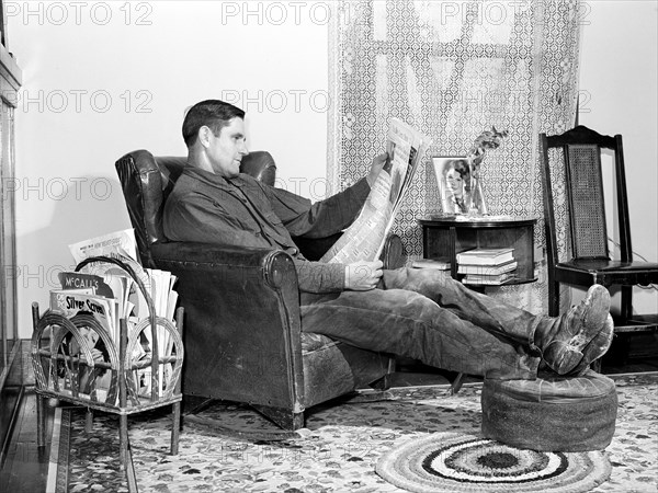 Lee Wagoner, Black Canyon Project farmer, relaxing at home, Canyon County, Idaho, USA, Russell Lee, U.S. Farm Security Administration, November 1941