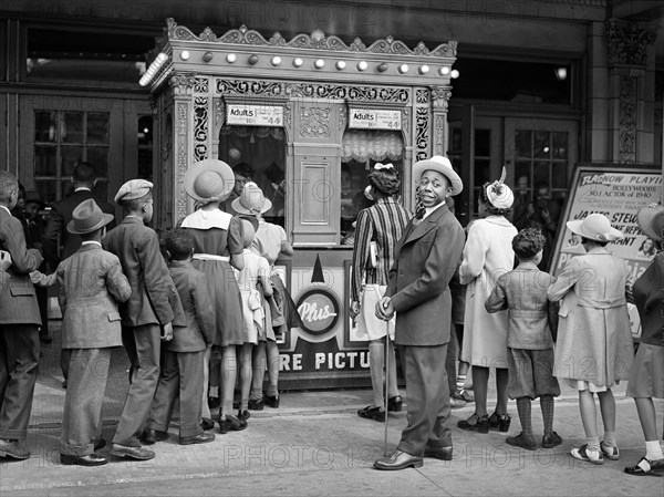 Crowd outside Movie Theater, South Side, Chicago, Illinois, USA, Russell Lee, U.S. Farm Security Administration, April 1941