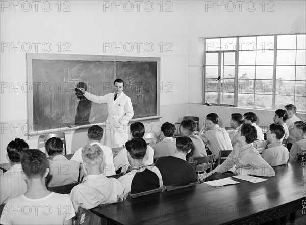 Instructor and students in class at vocational school for aircraft construction workers, San Diego, California, USA, Russell Lee, U.S. Farm Security Administration, May 1941