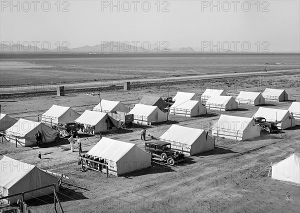 Tents at FSA (Farm Security Administration) farm workers' community, Friendly Corners, Arizona, USA, Russell Lee, U.S. Farm Security Administration, March 1942