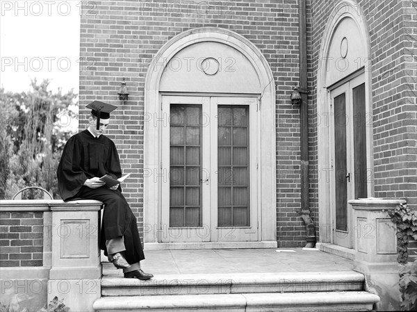 John Cockle in cap and gown on graduation day, University of Nebraska, Lincoln, Nebraska, USA, John Vachon, U.S. Office of War Information, May 1942