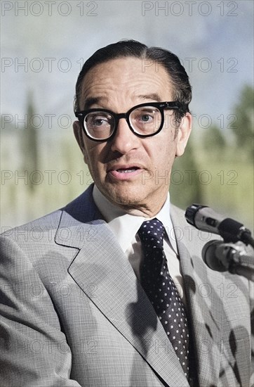 U.S. economist Alan Greenspan, head and shoulders portrait standing at microphones, Washington, D.C., USA, Marion S. Trikosko, U.S. News & World Report Magazine Photograph Collection, August 15, 1979