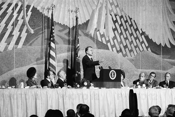 U.S. President Richard Nixon and U.S. First Lady Pat Nixon, both sitting left on dais, listening to Evangelist William F. "Billy" Graham giving principal address at 17th Annual National Prayer Breakfast, Sheraton Park Hotel, Washington, D.C., USA, Marion S. Trikosko, U.S. News & World Report Magazine Photograph Collection, January 30, 1969