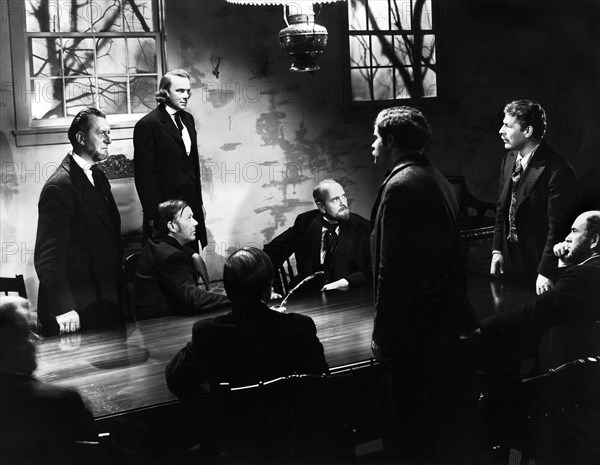 Dean Jagger (standing, 2nd left), Brian Donlevy (standing, far right), on-set of the film, "Brigham Young", 20th Century-Fox, 1940