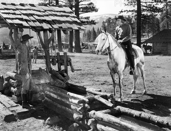 Dean Jagger (right), Arthur Aylesworth (left), on-set of the film, "Brigham Young", 20th Century-Fox, 1940