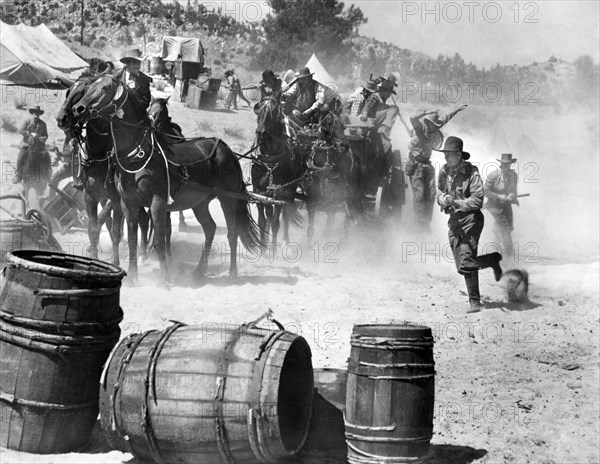 Fight scene, on-set of the film, "Buckskin Frontier", United Artists, 1943