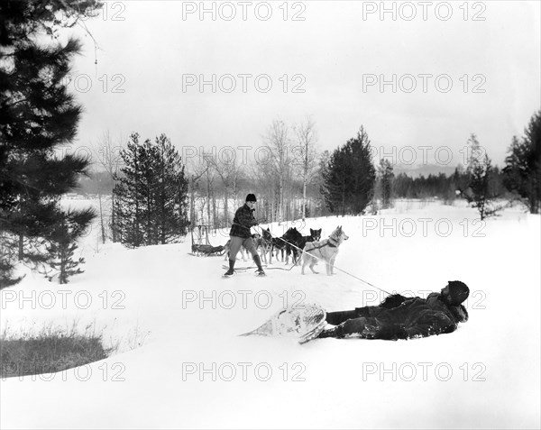 William Duncan (standing) on-set of the silent film, "Wolves of the North", Universal Pictures, 1924