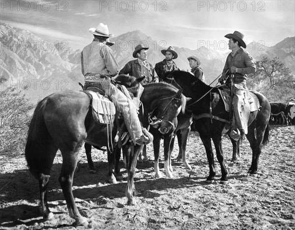 Bob Steele, Joel McCrea, Chill Willis, Howard Petrie, Henry Brandon, on-set of the film, "Cattle Drive", Universal Pictures, 1951