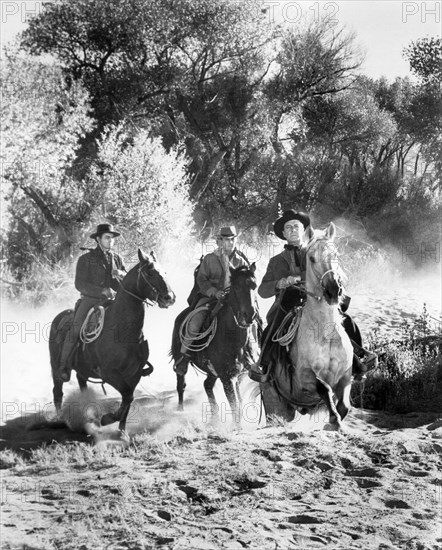 Robert Loggia (left), Robert Taylor (right), on-set of the film, "Cattle King", MGM, 1963