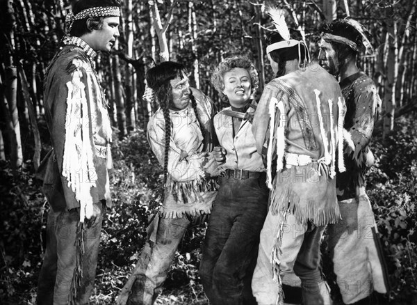 Lance Fuller (left), Barbara Stanwyck, on-set of the film, "Cattle Queen of Montana", RKO Radio Pictures, 1954