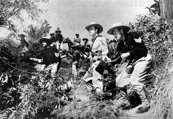 Myron Healey (2nd right), Richard Arlen (right), on-set of the film, "Cavalry Command", aka "The Day Of The Trumpet", People's Pictures, 1958