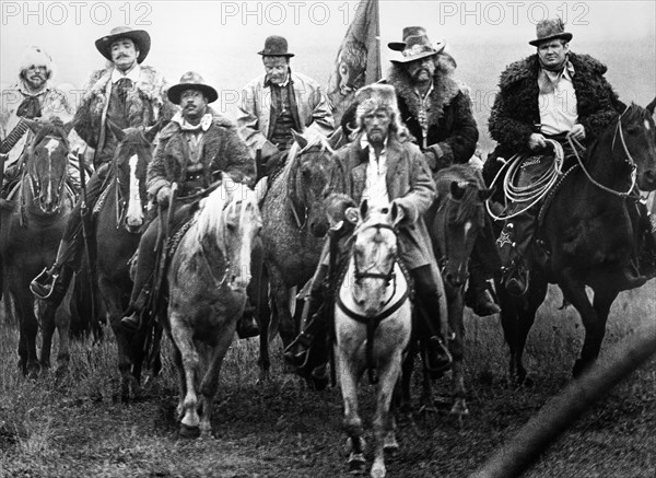 John Considine (2nd left), Robert DoQui (3rd left), Michael Kaplan (back, center), Paul Newman (front, center), on-set of the film, "Buffalo Bill And The Indians, Or Sitting Bull's History Lesson", United Artists, 1976