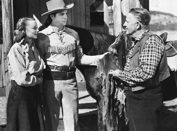 Jennifer Holt, Richard Arlen (center), on-set of the film, "Buffalo Bill Rides Again", Screen Guild Productions, 1947