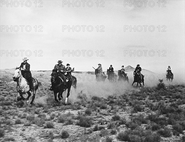 Audie Murphy, George Tobias, Ruta Lee, Edward Platt, Alan Hale, Jr., on-set of the film, "Bullet For A Badman", Universal Pictures, 1964