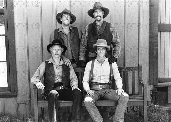 William Katt (bottom left), Tom Berenger (bottom right), Christopher Lloyd (top left), John Schuck (top right), on-set of the film, "Butch And Sundance: The Early Days", 20th Century-Fox, 1979