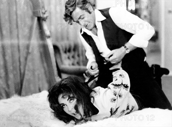 Elizabeth Taylor, Michael Caine, on-set of the British film, "X, Y And Zee", Columbia Pictures, 1972