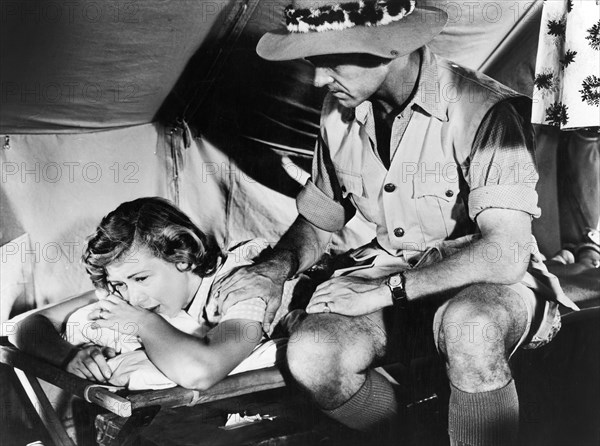 Dinah Sheridan, Anthony Steel, on-set of the British film, Where No Vultures Fly", released in U.S. as, "Ivory Hunter", General Film Distributors, 1951