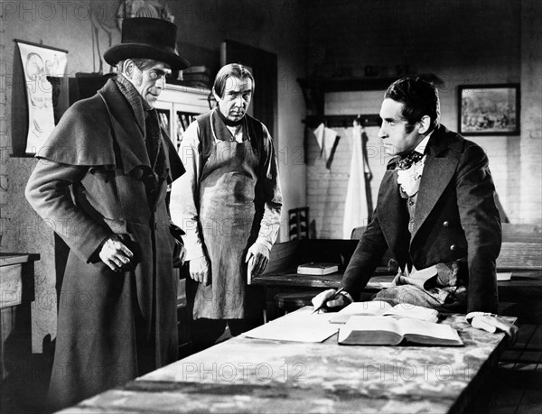 Boris Karloff, Bela Lugosi, Henry Daniel, on-set of the film, "The Body Snatcher", RKO Radio Pictures, 1945