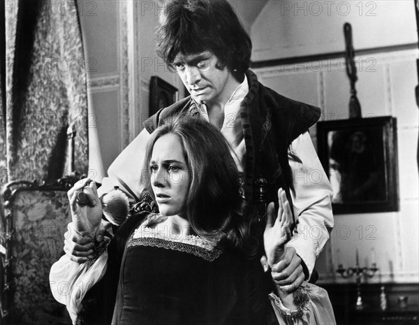 Patrick Mower, Hilary Heath, on-set of the British film, "Cry Of The Banshee", American International Pictures, 1970