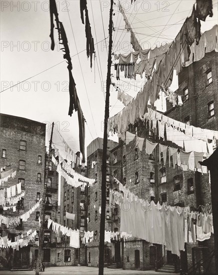 Courtyard of tenement buildings filled with lines of laundry, Yorkville, New York City, New York, USA, Berenice Abbott, Federal Art Project, "Changing New York", March 1936