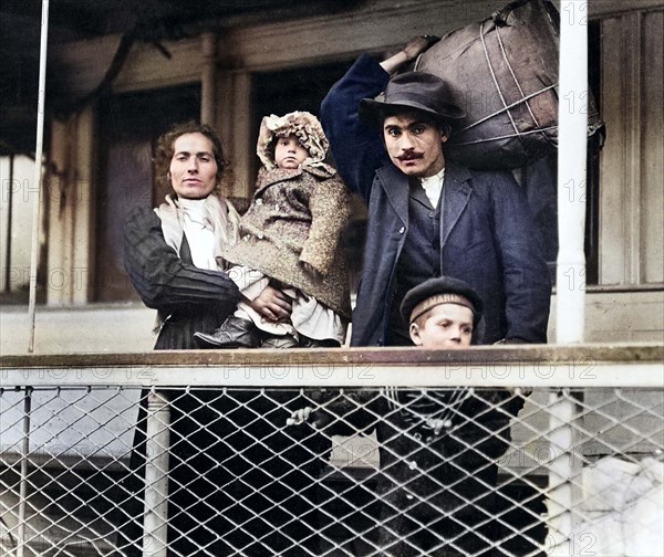 Italian immigrant family on ferry, leaving Ellis Island, New York City, New York, USA, Lewis Wickes Hine, 1905