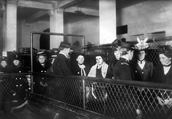 Group of arriving immigrants, Ellis Island, New York City, New York, USA, Bain News Service, 1910's