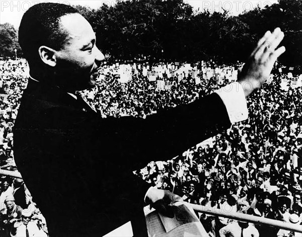 Dr. Martin Luther King, Jr., waving to crowd during from Lincoln Memorial during March on Washington for Jobs and Freedom, Washington, D.C., USA, August 28, 1963